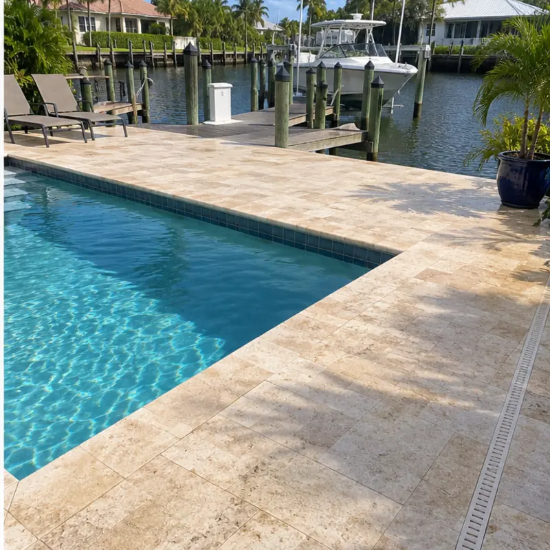 After cleaning: before and after photos of a Holmes Beach pool deck and canal dock
