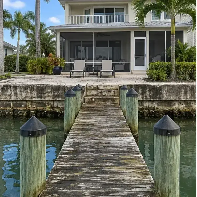 Before cleaning: before and after photos of a Palma Sola dock and bayfront home